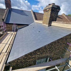 New slate roof Galway City project showing completed slate roof installation and extension roof upgrade