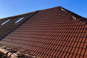 Recent Tiled Roof Completed in Limerick showing newly installed tiled roof with ridge tiles and treated battens