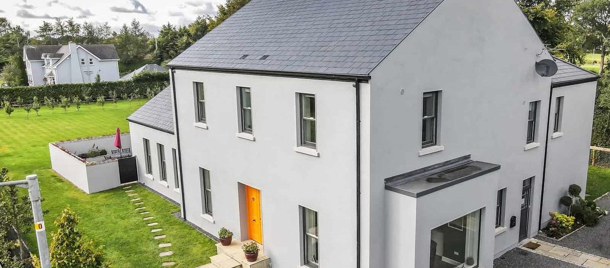 Are there grants for roof repairs in Ireland – Complete Roofing & Construction repairing tiled roof in Limerick.